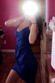 This dress is so cute! i loved the slit and it is a beautiful color - Angela C.