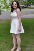 I love this dress! I wore it to a party and got so many compliments. You can adjust the straps in the back, so the fit wasn't a problem. I had to hem the bottom though because it was a little too long. I am short though, so I had a feeling that was going to happen. - Johnna P.