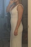 I really love the material of this dress and the simplicity of the design. I didn't want an extravagant wedding dress and I knew Lulu's would have amazing choices. I chose this because it mimics a lot of the higher end designs that I fell in love with. The fabric is heavy but stretchy and comfortable, I am only 5'3 so it definitely would need to be hemmed. I only decided to return it because I had fallen for another one of Lulu's bridal dresses. I definitely would recommend this to anyone that wants a simple affordable and high quality dress that they could easily resell or re-wear for a different occasion - Christeena S.
