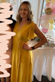 I own this dress in both yellow and sage green. I purchased the sage green to wear for for my baby shower. I love that the dress works so well for being pregnant or not. I didn't have to waste money on a maternity dress and now have something I can wear anytime. One issue is be very careful when washing - DO NOT DRY. I even put it in the dryer to get some wrinkles out and it shrunk up. - Andrea F.