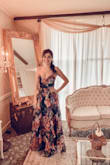 LOVE this dress!! It was so different, I have never gotten so many compliments. Super flowy and lightweight. I ordered a small. One thing to be aware of is I am 5'6" and it was a little long, even with 3in heels. But other than that, I was absolutely in love with it. Very flattering. EVERY dress I have ordered from Lulus has always been amazing, but this is probably by far my FAVORITE!! <3 - Venessa R.