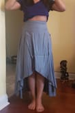 I love this skirt so much it's so gorgeous. I got the medium but it wouldn't stay up on my waist how I wanted so I got the small. I'm not that skinny so I'd recommend sizing down unless you want it to sit on your hips. - Arleen B.