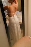 I must have have tried at least 8 online dresses and wasn't in love with any of them. I was about to give up and go into a bridal shop until I found this gorgeous dress! The material is high quality and so elegant. It's very flattering and Is a bit flowy. The back of the dress is the real reason why I fell in love! So excited to get married in this dress :) - Janine M.