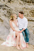 I wore this dress on the beach for my engagement photos and it was perfect! The dress was a little bustier than I expected but it worked out great. - Carley P.