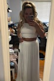 Exact look I was going for! Perfect for bachelorette and my honeymoon. Does NOT squeeze your waist like some waist bands it's flexible but not super tight if that makes sense. I was nervous about the top being see through since you can't really wear a bra and sticky bras aren't for me- but the material is strong and well made. The lace looks expensive, not cheaply put together. Cannot say enough about this item. So excited - Julie W.