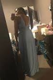 The color is a big darker than in photos. And definitely not made for shorter gals since it drags on the floor. Also not for larger chested women. Like it better on the model. - Andrea G.