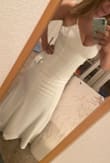 Bought this dress for my quickie Vegas wedding & couldn't be more satisfied! Dress fit perfectly! It hugs your figure in all the right places! Very flattering fit & cut. - Ashley R.