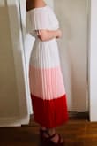 I love this two piece outfit. I plan on wearing this to my couple's shower in May. It's very comfortable. Will probably have to cut the "hang straps" out but that's no big deal! - Camille M.