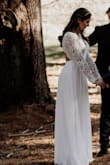 I bought this dress for my wedding in the woods and it was just perfect. It's a little long in length but nothing that can't be fixed. It's an amazing material and I love it. - Lory D.