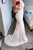 Saw a lot of GOOD reviews, a lot of amazing photos from other buyers. I love how the dress looks in the back. My husband liked it too so he bought it for me. He was just like "OMG" when he saw me tried it on. Highly recommended! - Thanh P.