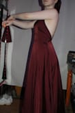 I LOVE this dress. The fabric has just the right amount satin shine and looks fancy. I bought to wear to prom, which is unfortunately postponed. I will need to have about 4 inches hemmed, as well as the back/waist brought in a bit. The top is a bit loose on the sides for me, and I think it's because my waist is smaller than the elastic at the waist is, so I'll need it to be altered for my preference. Also, the side slit is just the right height for me (about lower mid-thigh). I'll definitely consider buying from Lulus again! - Avery H.