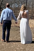 I wore this dress for my small intimate wedding. The dress is really long, but I wore wedges. I ordered another dress from lulus that was more form fitted and I fit a small, but for this dress I had to exchange my original for an XS. - Christina J.