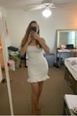 This dress was EXACTLY what I wanted! That being said, I normally would have bought a medium (and a medium still would have fit probably), but I went for a large because I wanted it to be a bit looser for graduation photos. This dress is perfect for curvy girls, as I normally struggle finding a dress that properly fits my waist and hips without being tailored. However, because this is so stretchy it worked perfectly! The material is thick so it will cover any "imperfections", and the dress is super comfy! The material does not feel cheap at all AND as an added bonus the dress was the perfect length, which is another thing I struggle with being relatively tall. I will most definitely be purchasing from here again! (Please ignore the background of my photos as I'm studying for finals and moving lol) - Arielle B.