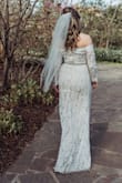 This dress was absolutely beautiful. Fit perfectly and lots of compliments. It was just what I was looking for. Accented with beautiful belt. - Kerri S.