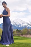 I wore this dress for prom and it was so beautiful. I am obsessed with the open lace-up back. With the lace-up back, you are able to make it as tight as you want so it fits perfectly and with heals the length was perfect. The material is very very delicate though so super small things like the oils from your fingertips are able to stain the dress and I can't figure out how to get these stains out of this fabric. The color looks very different in different lighting. - Kylie O.