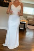 I wanted to love the dress because I love the back. The lace and low cut back are beautiful but the front straps and Lace look cheap. I returned it for another dress. - Julie B.