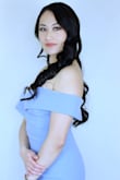The fabric is soft and feels luxurious. I love how the fabric can also stretch and hugs your body. It's definitely worth my $100! I wore a size small and I weigh 125lbs. - Yer L.