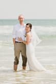 This dress fit perfectly! Ordered a small and I did not need any alterations at all, even in the length, which is nice. This dress was great for our private beach ceremony. So comfortable and easy to move in. The only negative is that the hem picks up anything; any sticks or leaves on the ground easily attached to it and would hardly come off. But, after going into the ocean wearing this, this dress will be worn only once. Overall, such a great deal for a beautiful dress! - Lauren B.