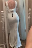 Overall a steal for $85!
The front was a little bunchy in the waist but the back was stunning! The fabric is not see through, which is important for a white dress and has some stretch so it is very comfortable. I tried it on with a shorter heel but I could have easily worn an 3-4 inch heel and it wouldn't drag on the ground.
Ultimately, I decided to return, but it was a contender! - Heather B.