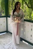 This dress was simply stunning. I purchased 5 or so dresses from Lulus, loved most of them, and tried them on for my family. We were all a little indecisive but I settled on one (still a gorgeous dress). But then I kept seeing photos of this dress and I couldn't get it out of my mind! So 2 weeks before our wedding I ordered it (after stalking it to see the second my size became available. I originally wanted a large, but XL came in stock and I ordered it. Glad I did! It was a tiny bit loose on the waist but tight on the hips for sure, large would not have fit) and Lulu's had it here a few days later. I tried it on for a few seconds in secret and LOVED it, but I knew I wanted the slit closed. Since I was short on time I immediately took it off and ran it to the tailor. It was ready the DAY BEFORE our intimate ceremony, and it was an absolute crowd pleaser when I put it on at the venue. ABSOLUTELY PERFECT and goes with so many vibes, not just boho. - Alyssa H.