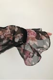 The sleeves are really huge - they cover my whole hand and fingers and are also very wide. It must be a mistake in the design. Very disappointing. - Nevena G.