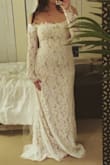 This dress is beautiful. If it were a little more comfortable, it would be a 5 star dress for sure. It's the arm and bust area that is a little uncomfortable and tight. You definitely won't have a full range of motion in this dress. That being said, the actual body of the dress isn't tight at all, it compliments curves well, but if you do have places that you are little insecure about, it won't hide those either. Overall this dress is exactly what I was looking for for my wedding ceremony. I did have to get a second dress to change into for the reception, so that I would be able to more my arms more and dance. - Alexandra P.