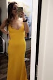 If it was socially acceptable to get married in a yellow dress, I would. I've been in love with this dress for the past year and finally had the occasion to wear it! I ordered it months in advance and WOW it's beautiful! It's definitely on the longer side but I'm pretty short so that was to be expected. Unfortunately I didn't end up going to the event because of coronavirus but I can assure you this dress will earn its showstopping night because it is GORGEOUS. It's tight but very flattering. - Kayla L.
