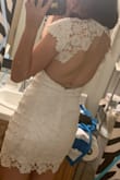 This is such a stunning dress. The fit flatters and accentuates curves, but doesn't feel too tight. However, I do think I will have to take it to the tailor to get it brought in ever so slightly in the back, just to make it all come together. Other than that, though, it really is the dream bridal shower or graduation dress!!! It is absolutely beautiful material. - Gabriella Z.