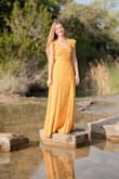 Beautiful flowy dress perfect for senior pictures and perfect yellow color! - Madison S.