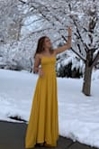 I absolutely love this dress! It has two layers of fabric with a lovely silk one underneath. I originally got it for prom, although that was cancelled, I think it can be worn for a lot of different occasions. It is a bit long but with heels it's manageable. - Lena L.