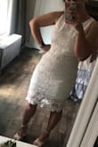 I go back and forth between ordering mediums and larges from Lulus. My top half is a lot smaller than my bottom half, but I took a risk ordering this in a medium. If I had sized up to a large the top would have been way too big. The skirt is a little tight around my waist but fits me perfectly every where else. Looking forward to wearing this to my bridal shower in July. I think the length of the skirt is very flattering and it looks more like a dress than two separate pieces on me, but I'm totally okay with that! - Ashley H.