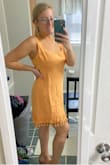 Bought this dress because it looked like the perfect dress to wear to Mexico for my honeymoon! I loved the orange color for summer as well. I could only get this in a Large and although I'm in between a medium and a large size, the large was definitely big. But I would say it runs true to size because I bought 2 other dresses in Medium and they fit perfectly so if I bought this in a Medium it probably would've fit better. I just didn't have that option in the color because they were out of stock! Love this dress though and I will still be wearing it! - Alyssa E.