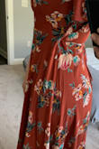 I love all of my Lulus dresses and this one is no exception! I tend to go for form-fitting and the wrap is just a tiny bit too loose around my waist for my liking. I'm usually between a M - L depending on the material and I feel like I could've even gotten a S in this. There's quite a bit of extra fabric where the wrap goes to the other side (pic attached) but I'll just tie it a little looser - not a huge deal! - Yadira H.