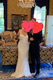 I couldn't have wished for a better dress to wear to get married! And only for ~$100, just an amazing deal as it fit PERFECTLY and needed no alterations. I was a bit bugged at first that the front (and train) was a bit long, but that's just me not being used to gowns and trains and I'm glad that I didn't get it altered because I needed the excess so that we could flower the train to get it looking so pretty in photos.

I ordered 4 white wedding dresses initially from Lulu's as I wasn't sure which would fit my body best (I have very wide shoulders, torso and most dresses are not flattering) so out of those 4, this Rosetta was the winner! I LOVE the fact that Lulus offers a 10 day free return policy because I did return 2 dresses immediately before the 7 day policy, and eventually before the 30 day policy I returned the 3rd one because I was on the fence about it but ultimately landed with the Rosetta. 

I can't thank Lulus enough for sourcing such an affordable and beautiful dress - THANK YOU! - Nancy N.