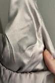 This dress is gorgeous! The color is a little darker in person, so doesn't look too white if your going to a wedding. Flow is nice. Also lined inside by a very soft material. Could dance all night! - JT V.