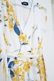 I LOVED this dress!. I ordered a size M because I have wide hips and I was worried that the bottom skirt was going to be tight but it is as loose as the outer skirt so you can go for a size S. It was a little loose on the bust and I used a pin and it was perfect (go for a size S if you want the top to look like the model). The quality of the fabric is good and soft (does not itch) and is very well built. The print looks beautiful and the zipper doesn't show. - Daniela B.