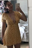 I LOVE this dress. It's absolutely stunning and flows very nicely. It's a good length; at 5'10", I usually find that "mini" dresses show a little too much booty for my taste, but this sits below my finger tips. It's a tasteful balance to the incredibly low cut neckline- pictures are with and without a bra so you can see how it hangs. It'll take a bit of getting used to, but bc it's lined it is perfectly fine to wear without a bra - I just need to build up the confidence! - Sabrina D.