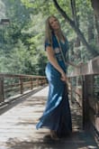 This dress worked out great for my graduation photos. It is long enough to wear heels and the waist ties allow you to fit the dress to your form exactly. The material is a little sheer up top but there is a double layer around the waist. - Kaitlyn M.