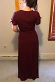 Decided between this and another and am so happy with this choice! The wrap waist helps highlight petite figure. As others mention the dress is very long. Will have to have it hemmed even if I wore my tallest heels. - Courtney W.
