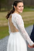 My wedding was postponed due to COVID-19 but we decided we still wanted to elope and keep our wedding date. I couldn't get my dress because the shop is closed, so I ordered this last minute. It shipped fast enough for me to return it and order a smaller size. I am usually a medium, but the dress ran a little big so I would order a size down. It was perfect for a quaint and intimate ceremony. I highly recommend, it made our special day that much more perfect. It was comfortable and light and (once the smaller size came) fit perfectly. Also, incredibly easy to clean! All around, great buy! - Alixandra L.