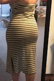 Ok I LOVE this. Such a sexy dress. I'm usually between a M or L but went with my gut and got a L and it fits perfect. If I had a flatter stomach maybe the M would've "fit like a glove" more, but I like tight dresses a little less snug.  I was almost debating getting a XL but am so happy I didn't, it's kind of big on the bottom as you can see in the photo, it doesn't hug below my thighs like it does on the model, not a dealbreaker though! - Olivia L.