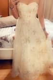 Great material, dress is absolutely beautiful and it's a perfect fit - Michelle S.