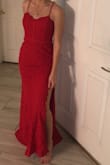 This dress was absolutely gorgeous. The fit of it was so flattering and the ladies was beautiful especially on the legs lit. I was so excited to wear this dress to my prom but unfortunately did not get to but I would for sure recommend this beautiful dress. - Gabby G.