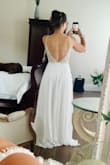 This dress is amazing! It is exactly as pictured and all the other reviews were right on point. You won't be disappointed. It is well made, elegant, and fits well. I may have it taken in an inch in the back as it is a tad loose there, but I couldn't go down because of my cup size. - Andra B.