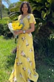 I love the dress, it's simple to tie and fits perfectly around the chest. However, the dress is a tad bit long for us short girls. I constantly tripped over the bottom of the dress and because of the slit its a little uncomfortable lift it to walk. Other than that I love it so much!! - Nnenna O.