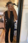 This jumpsuit is super sexy and classy at the same time! It's really flattering on the body and hugs your hips in a good way to show off your curves. - Callie R.