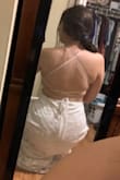 The dress does not lace up very well. It felt like I was using a shoe lace string to hold up the whole upper half of the dress. And the way that you tie it, it has to be super tight on your back to keep the top in place on your chest. Returning it. - Katherine P.