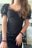 Super cute dress - the detailing, length, and fit are perfect. I agree with other reviews that it is a bit scratchy (especially around the sleeves) but nothing too bad. The neckline is beautiful and looks just like the picture. Overall would recommend! - Ana C.