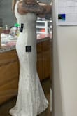 So soft and fits perfectly! Bought this dress because I had to postpone my wedding due to COVID and decided to save my other wedding dress for our big celebration next year! Great price and I feel very bridal in it! I have to have the length shortened but that's expected in every maxi dress I order due to my height. - Nicole P.