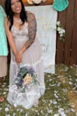The waist band was a little snug but the dress was beautiful! - Hilary E.